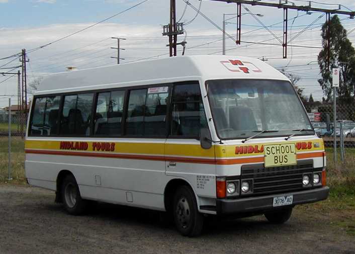 Midland Tours Mazda T3500 13